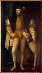 Portrait of Emperor Charles V (1500 - 1558) aged 35 with his dog Sampere. Tiziano Vecellio, called Titian (1485-1576)