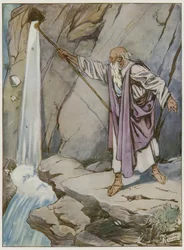 Moses striking the rock to bring forth water