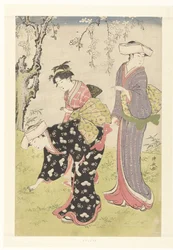 Two Women and a Girl Under a Blooming Cherry Tree