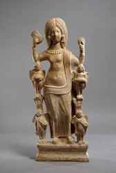 Terracotta statuette of Venus, or a young woman dressed as Venus, at her toilet, c.200-230