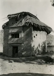 Square hut with thatched roof, Axum, Ethiopia