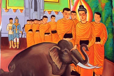 Wat Si Muang Buddhist Temple. Painting Depicting the Life Story of Shakyamuni Buddha. A Wild Elephant Tamed by Loving-Kindness, Vientiane, Laos