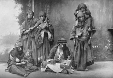 A Bedouin musician and his audience