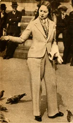 A Betrousered Lady Feeding Pigeons in Trafalgar Square