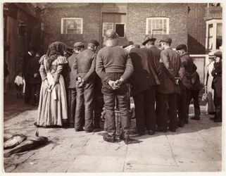 A fish auction, c 1905