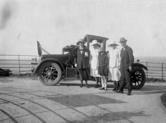 A Group of People in Front of Their Car at the Seaside, c1920s