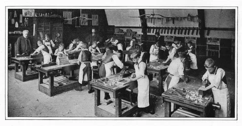 A manual training centre: woodwork, London