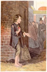 A poor boy, shoeless and in rags, begging on a street corner, c1880