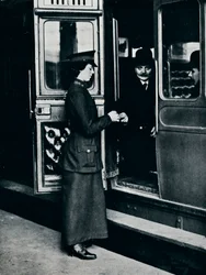 A woman ticket inspector at work