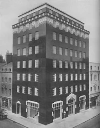 An All-Black Building in London Relieved by a Lace-Like Collar of White, c1935