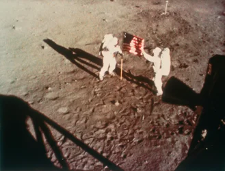 Armstrong and Aldrin Unfurl the US Flag on the Moon