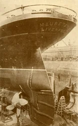 At Work on the Stern of the Mauretania, in Dry Dock, c1930