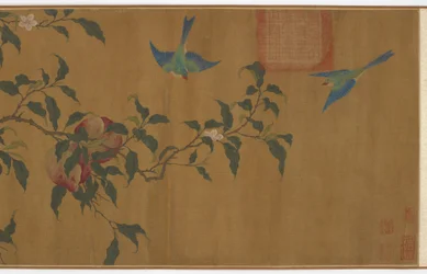 Birds among peach branches