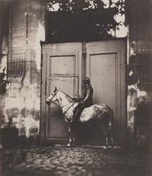 Black Horseman in Front of a Doorway