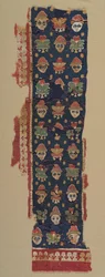 Border of Heads and Palmettes from a Large Hanging