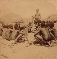 Braves of a Zulu Village Holding a Council, Near the Umlaloose River, Zululand, S.A., 1901