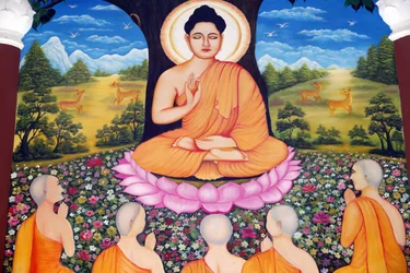 Chua Tu Quang Buddhist Temple. Shakyamuni Buddha Preaching the Sermon - the Wheel of Law - to His Five Disciples. Vung Tau. Vietnam