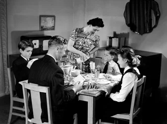 Family at breakfast, c 1948