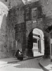 Gateway and entrance to the only street of Mont St Michel, Normandy, France, 20th century
