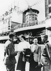 German Soldiers Chatting Up French Women Outside the Moulin Rouge, Occupied Paris