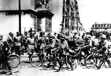 German Soldiers Marching Past the Arc de Triomphe, Paris