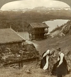 Gossip at a Wayside Inn at Botten, Overlooking the Voxli Lake - View Toward Haukeli Mts., Norway