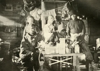 Group in the Hut in the Summer: Joyce at the Sewing Machine