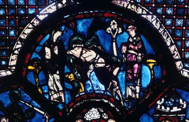 Injured pilgrim ignored by priest and Levite, stained glass, Chartres Cathedral, France