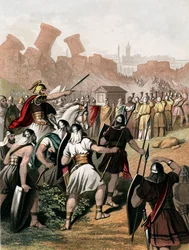Joshua urges on his army outside the walls of Jericho