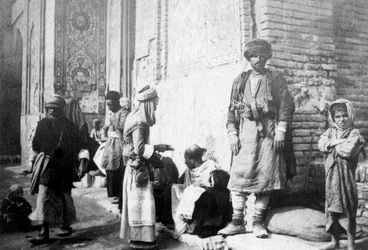 Kurdish barber, outside Kazimain mosque, Iraq