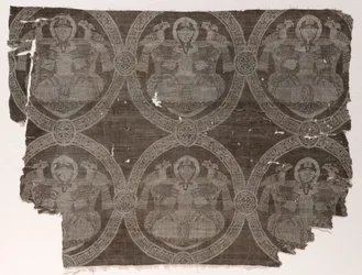 Lampas fragment with seated prince holding falcons in kufic medallions