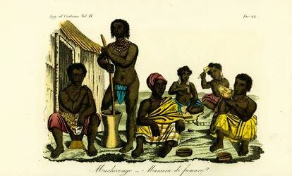 Muchicongo Men and Many Wives Outside a Hut, Angola