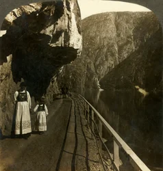 Narrow Rock-Shelf Where the Road to Voring Falls Past Lake Oifjords Deep Waters, Norway