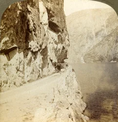 Path blasted out of the towering cliffs for a road around Oifjords Lake, Norway, 1905