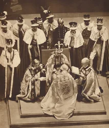 Primate Kneels at the King