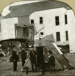 Refugees Camp, Former Dwelling in Ruins in Background