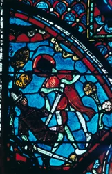 Roland pierces the giant Ferragut in the navel, stained glass, Chartres Cathedral
