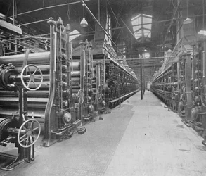 Showing Two Board-Making Machines and Indicating Something of Their Great Length and Complexity