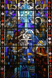 Stained glass in Notre Dame du Rosaire catholic church: Nativity scene, Saint-Ouen, France
