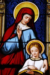Stained glass in Saint-Louis cathedral: Mary taught by her mother Ann, Blois, France