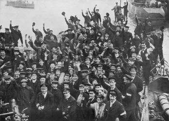 The crew of HMS Vindictive celebrating the Zeebrugge Raid on 23 April 1918