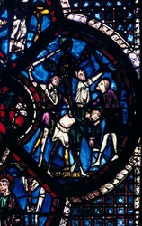 The pilgrim attacked by thieves, stained glass, Chartres Cathedral, France