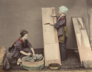 Two Japanese Women Posing with Laundry