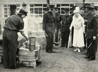 Watching A.T.S. girls at work...Army School of Cookery at Aldershot