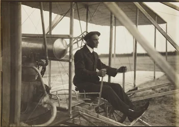 Wilbur Wright in the flyer