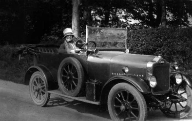 Woman driving a car, 1930