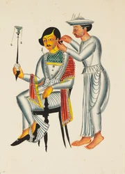 Young Bengali having his ears pierced