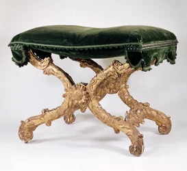 French Regency (1700-1720) X-Frame Stool, of Giltwood with Upholstered Seat, Leaves and Flame Motif, Sunflower at Intersection