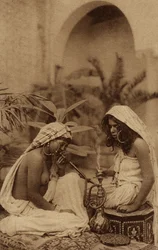 Harem Girls Smoking a Hookah, from an Early 20th Century Postcard