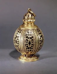 Pomander, decorated with chased scrollwork enclosing black enamel, silver-gilt, probably English, c.1580